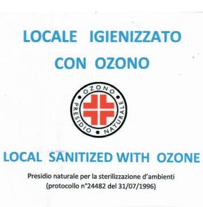 a visa stamp with a red cross on it at The One Firenze in Florence