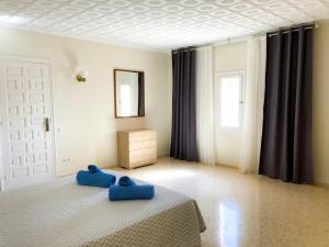 Łóżko lub łóżka w pokoju w obiekcie Chalet Cucarres