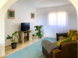 Telewizja i/lub zestaw kina domowego w obiekcie Chalet Cucarres