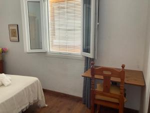 Postel nebo postele na pokoji v ubytování Casa Amparo casco histórico