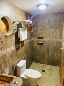 Koupelna v ubytování Cabañas Telayú + 37 fotografií
