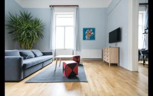Televízia a/alebo spoločenská miestnosť v ubytovaní BudapeStayz - Jozsef Apartments