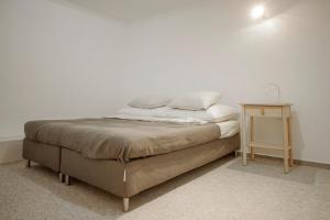 Posteľ alebo postele v izbe v ubytovaní BudapeStayz - Jozsef Apartments