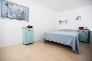 Posteľ alebo postele v izbe v ubytovaní BudapeStayz - Jozsef Apartments