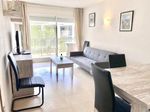 A seating area at Modern Apartment in Salou - 50 m² + Pool