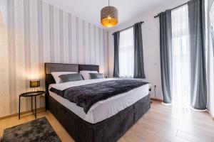 Postel nebo postele na pokoji v ubytování DreamHouse7 rooms