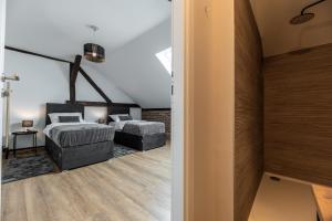 Postel nebo postele na pokoji v ubytování DreamHouse7 rooms