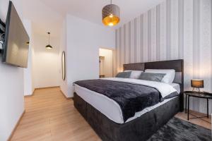 Postel nebo postele na pokoji v ubytování DreamHouse7 rooms