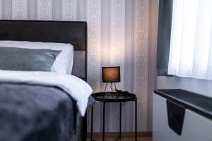 Postel nebo postele na pokoji v ubytování DreamHouse7 rooms