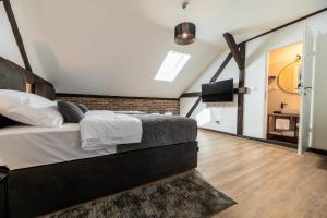 Postel nebo postele na pokoji v ubytování DreamHouse7 rooms