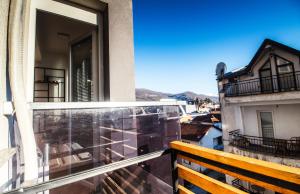 a balcony with a view of a building at Krkulj Apartments in Ohrid