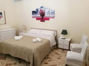 Posteľ alebo postele v izbe v ubytovaní Casa Mia, vacanze