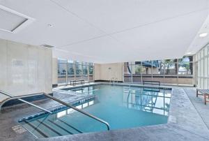 a large swimming pool in a building at Crystal Tower 1408 - Lazy River, Beachfront pool, Amazing Views, New Upgrades!! in Gulf Shores