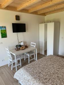 TV/trung tâm giải trí tại B&B La Casa Del Sole