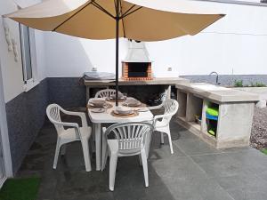 Patio lub wspólna przestrzeń na świeżym powietrzu w obiekcie Caleta de Interian Loft Sasy