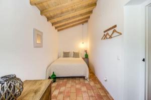 Postel nebo postele na pokoji v ubytování Monte Alentejano - Melides