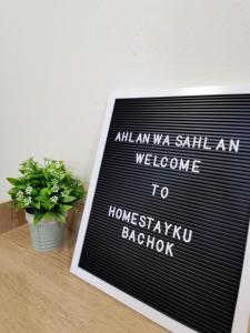 a sign that reads all an ma salman welcome to homestayhoghoghog at HomestayKu @Bachok in Bachok
