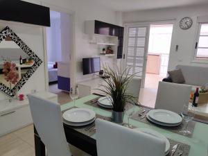A television and/or entertainment centre at Los Cristianos - heated swimming pool air-conditioned