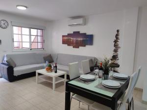 A seating area at Los Cristianos - heated swimming pool air-conditioned