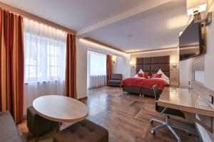 Postel nebo postele na pokoji v ubytování Hotel Ludwigs