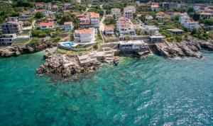 an aerial view of a resort on the water at Guest House del Mare in Dobra Voda