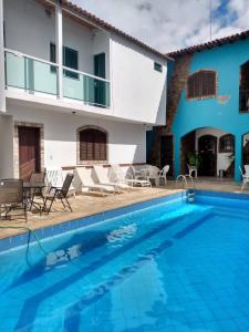 Πισίνα στο ή κοντά στο Cabo Frio Suíte com cozinha