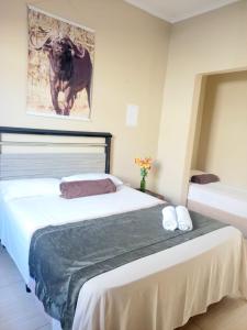 Llit o llits en una habitació de Pousada Zambeze