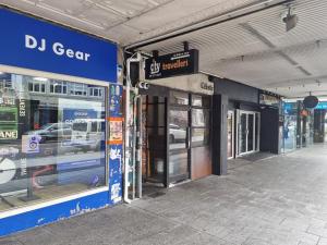 a building with a duclear sign on the side of it at K Road City Travellers in Auckland