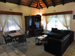 Χώρος καθιστικού στο Impala Niezel Lodge & Guest House