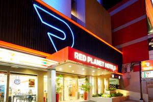 Сертифікат, нагорода, вивіска або інший документ, виставлений в Red Planet Quezon City Timog