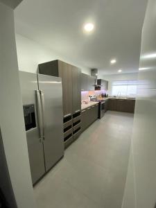 A kitchen or kitchenette at Luxury Apartments Lima