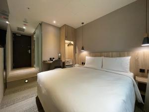 Voodi või voodid majutusasutuse N Hotel toas
