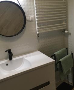 Kúpeľňa v ubytovaní Apartament Miętowa Zebra