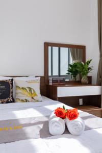 Giường trong phòng chung tại Palm Villa 34 ( Luxury Villa with 17 bed room, karaoke & bida inside)