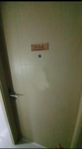 a door with a sign on it in a room at 05-06 at Wind Residences Tagaytay in Tagaytay