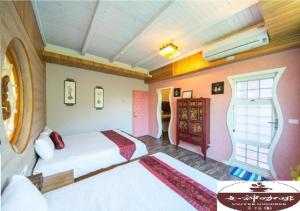 Krevet ili kreveti u jedinici u okviru objekta Happiness Homestay