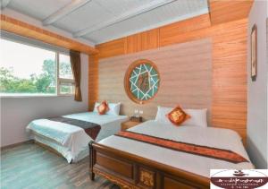 Krevet ili kreveti u jedinici u okviru objekta Happiness Homestay