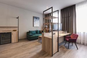 Posezení v ubytování Hotel Das Bischof + 16 fotografií