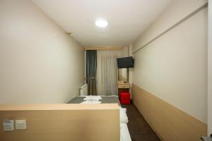 Postel nebo postele na pokoji v ubytování Hotel Melita