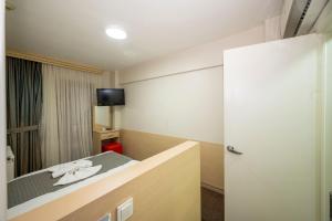 TV a/nebo společenská místnost v ubytování Hotel Melita