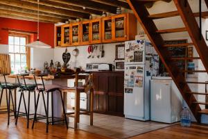 A kitchen or kitchenette at Hermanus surf school and Lodge