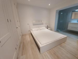 A bed or beds in a room at Cas Catalá Living