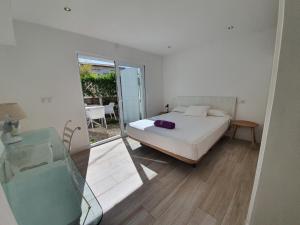 A bed or beds in a room at Cas Catalá Living
