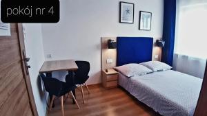 Pokoje Gościnne Gąsowscy Dzieci od 12 roku życia客房内的一张或多张床位