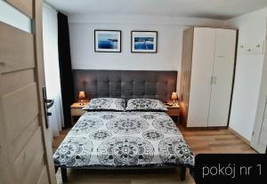 Pokoje Gościnne Gąsowscy Dzieci od 12 roku życia客房内的一张或多张床位