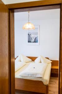 Postel nebo postele na pokoji v ubytování Haus Kindler