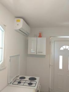 Kuchyň nebo kuchyňský kout v ubytování Apartmani Branka