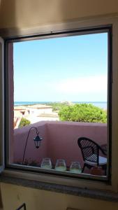 Μπαλκόνι ή βεράντα στο un angolo di Paradiso a pochi passi dal mare nel villaggio Calarossa +12 φωτογραφίες