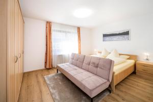 Postel nebo postele na pokoji v ubytování Haus Kindler