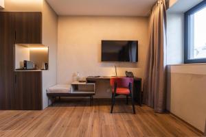 Μια τηλεόραση ή/και κέντρο ψυχαγωγίας στο Hotel Monvillage